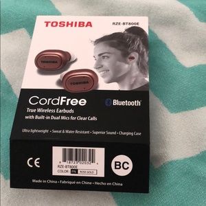 Toshiba cordfree True wireless earbuds. Rose gold